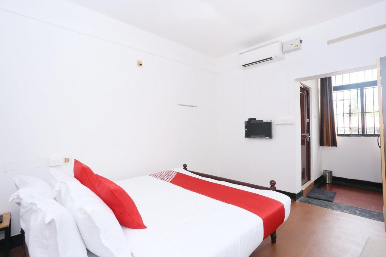 Oyo Flagship Kaveri Tourist Home Guruvāyūr Екстериор снимка