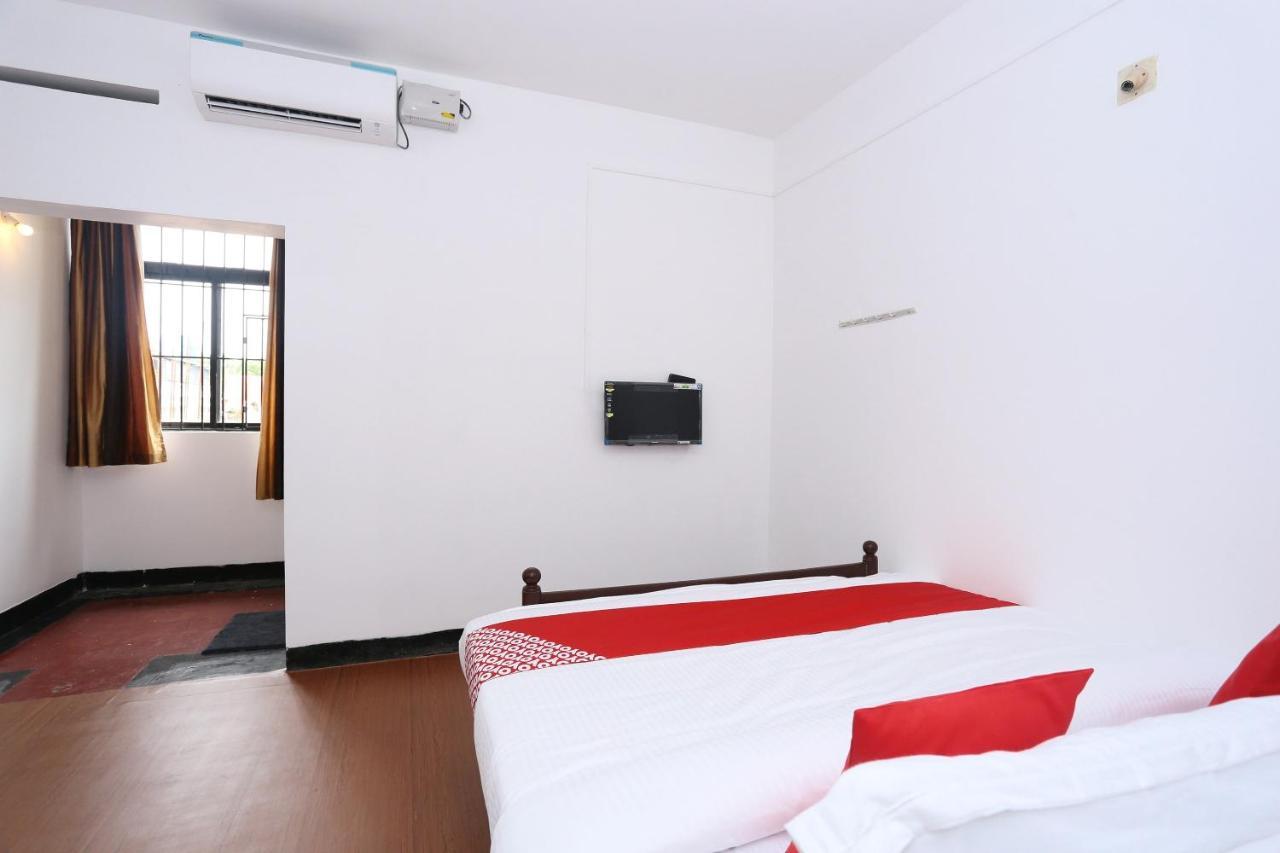 Oyo Flagship Kaveri Tourist Home Guruvāyūr Екстериор снимка